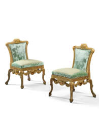 A PAIR OF GEORGE II WALNUT AND PARCEL-GILT SIDE CHAIRS