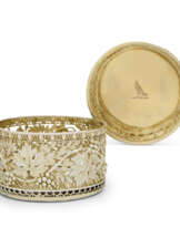 A PAIR OF GEORGE III SILVER-GILT WINE COASTERS