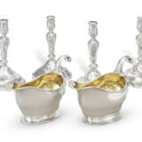 A SET OF FOUR ROYAL GERMAN SILVER CANDLESTICKS AND A PAIR OF SILVER SAUCEBOATS FROM THE `FA` IN SHIELD SERVICE - фото 1