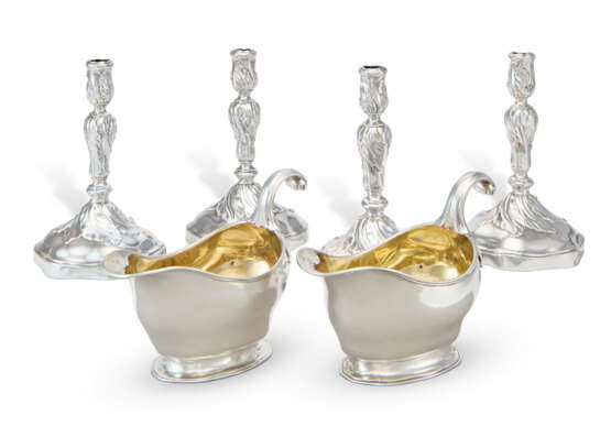 A SET OF FOUR ROYAL GERMAN SILVER CANDLESTICKS AND A PAIR OF SILVER SAUCEBOATS FROM THE `FA` IN SHIELD SERVICE - фото 1