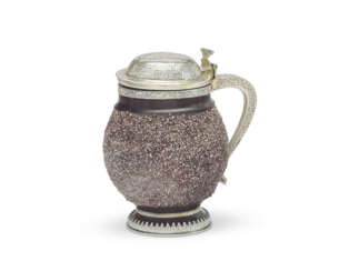 A CONTINENTAL SILVER-GILT MOUNTED STONEWARE TANKARD