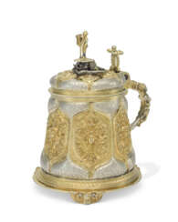 A GERMAN PARCEL-GILT SILVER TANKARD