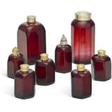 A GROUP OF EIGHT GERMAN SILVER AND SILVER-GILT MOUNTED RUBY GLASS BOTTLES AND COVERS - photo 1