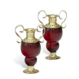 A PAIR OF GERMAN SILVER-GILT MOUNTED SMALL RUBY GLASS TWO-HANDLED VASES - фото 1