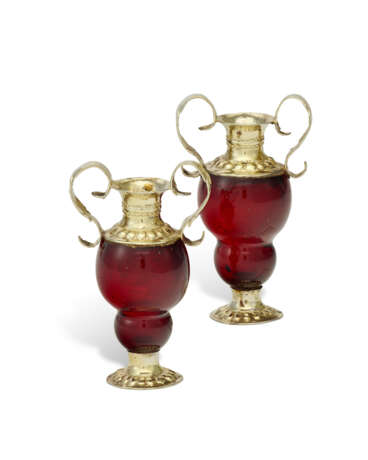 A PAIR OF GERMAN SILVER-GILT MOUNTED SMALL RUBY GLASS TWO-HANDLED VASES - фото 1