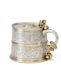 A GERMAN PARCEL-GILT SILVER TANKARD