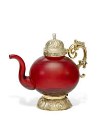 A CONTINENTAL SILVER-GILT MOUNTED RUBY GLASS TEAPOT AND COVER