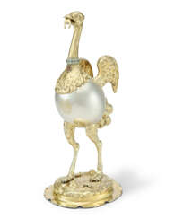 A GERMAN PARCEL-GILT SILVER, ENAMEL AND GEM-SET OSTRICH-FORM CUP AND COVER