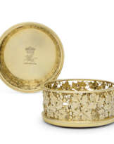 A PAIR OF GEORGE III SILVER-GILT WINE COASTERS