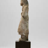 AN EGYPTIAN LIMESTONE OVERSEER SHABTI - photo 4