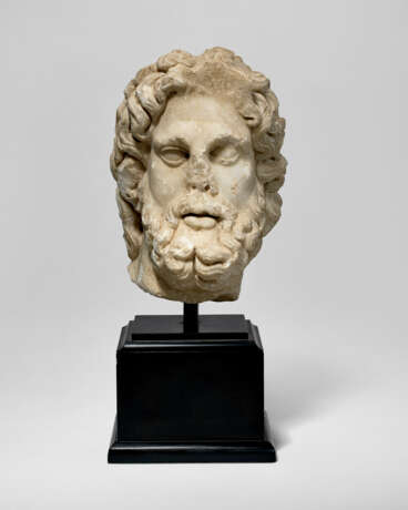 A ROMAN MARBLE HEAD OF ASCLEPIUS - Foto 1