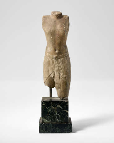 AN EGYPTIAN LIMESTONE SCULPTOR`S MODEL OF A STRIDING OFFICIAL - photo 1