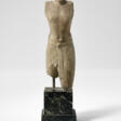 AN EGYPTIAN LIMESTONE SCULPTOR&#39;S MODEL OF A STRIDING OFFICIAL - Now at the auction