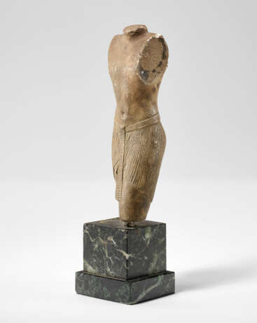 AN EGYPTIAN LIMESTONE SCULPTOR`S MODEL OF A STRIDING OFFICIAL - photo 4