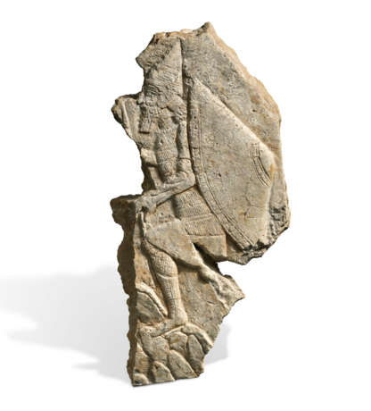 AN ASSYRIAN GYPSUM RELIEF FRAGMENT - фото 1