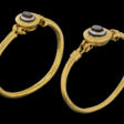 TWO EGYPTIAN GOLD AND GLASS BRACELETS - Auction prices