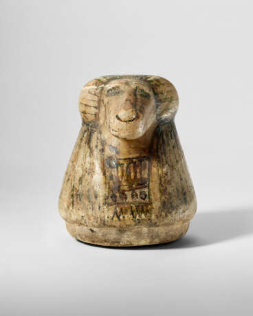 AN EGYPTIAN PAINTED ALABASTER CANOPIC JAR LID IN THE FORM OF HAPI - photo 1