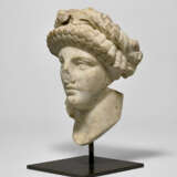 A ROMAN MARBLE ARCHAISTIC HEAD OF A DEITY - photo 2