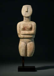 A LARGE CYCLADIC MARBLE FEMALE FIGURE