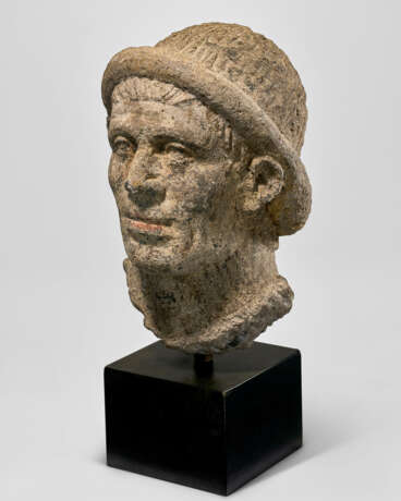 AN ETRUSCAN NENFRO PORTRAIT HEAD OF A MAN - photo 2