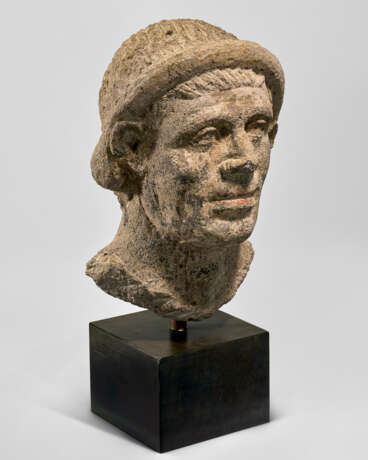 AN ETRUSCAN NENFRO PORTRAIT HEAD OF A MAN - photo 4