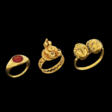 TWO ROMAN GOLD FINGER RINGS AND A ROMAN GOLD AND CARNELIAN FINGER RING - Auction prices