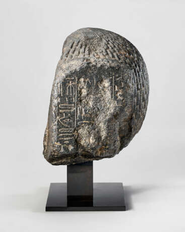 AN EGYPTIAN GRANODIORITE PORTRAIT HEAD OF AN OFFICIAL - photo 3