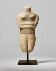 A CYCLADIC MARBLE FEMALE FIGURE