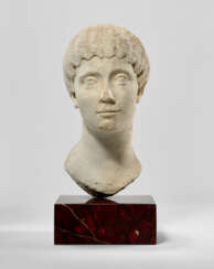 A ROMAN MARBLE PORTRAIT BUST OF A WOMAN