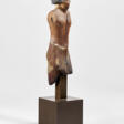 AN EGYPTIAN WOOD STRIDING OFFICIAL - Auction prices