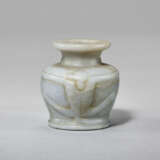 AN EGYPTIAN ANHYDRITE KOHL JAR WITH MONKEYS - photo 1