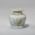 AN EGYPTIAN ANHYDRITE KOHL JAR WITH MONKEYS - Аукционные цены