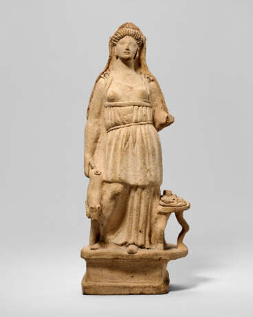 A GREEK TERRACOTTA GODDESS WITH A PIG - photo 1