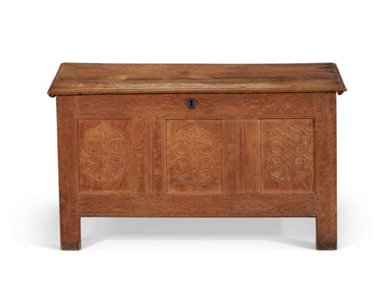 A CARVED AND JOINED OAK CHEST - photo 1