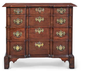 A CHIPPENDALE MAHOGANY BLOCK-FRONT CHEST-OF-DRAWERS