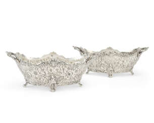 A NEAR PAIR OF AMERICAN SILVER TWO-HANDLED LARGE SWEETMEAT BASKETS