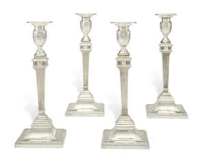 A SET OF FOUR AMERICAN SILVER CANDLESTICKS