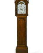 Federal style (1780–1820). A FEDERAL BRASS-MOUNTED MAHOGANY TALL CASE CLOCK