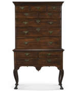 Storage furniture. A QUEEN ANNE CARVED AND FIGURED MAPLE HIGH CHEST-OF-DRAWERS