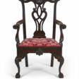 A CHIPPENDALE CARVED WALNUT OPEN ARMCHAIR - Auktionspreise