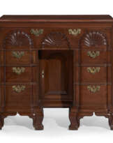 THE JABEZ BOWEN CHIPPENDALE CARVED MAHOGANY BLOCK-AND-SHELL BUREAU TABLE