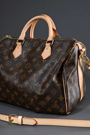 Louis Vuitton "Speedy 30" Tasche in Monogram Canvas, heller Rindslederbesatz und -schulterriemen, innen Textilfutter, goldfarbene Beschläge und Schloss, 2 Schlüssel mit Staubbeutel, 2023, 21x30x17cm, Riemen get… - фото 1