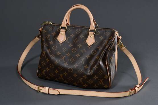 Louis Vuitton "Speedy 30" Tasche in Monogram Canvas, heller Rindslederbesatz und -schulterriemen, innen Textilfutter, goldfarbene Beschläge und Schloss, 2 Schlüssel mit Staubbeutel, 2023, 21x30x17cm, Riemen get… - фото 2