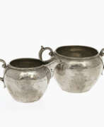 Silverware. A two-piece set with milk jug and sugar bowl