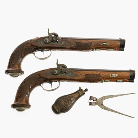 A pair of percussion duelling pistols with various accessories in a wooden box - photo 2