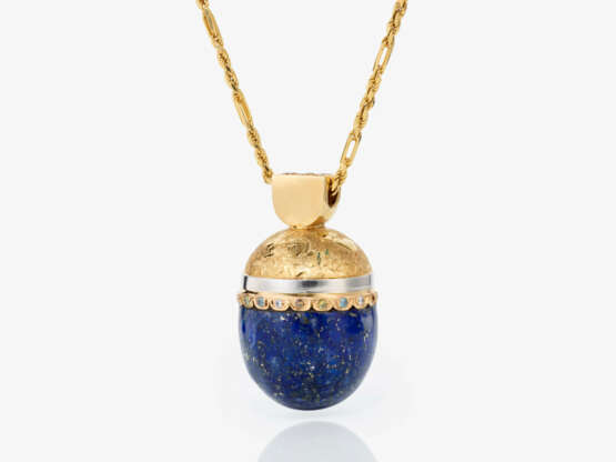 A lapis lazuli pendant with brilliant-cut diamonds on a necklace - фото 1