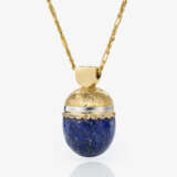 A lapis lazuli pendant with brilliant-cut diamonds on a necklace - фото 1