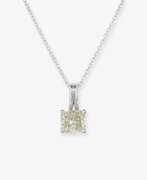 Neck jewellery. A pendant necklace decorated with a diamond in the currently trendy fancy light brown