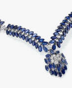 Neck jewellery. A necklace with sapphires and brilliant-cut diamonds