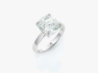 A solitaire ring set with a fine and large diamond in a modern cushion cut